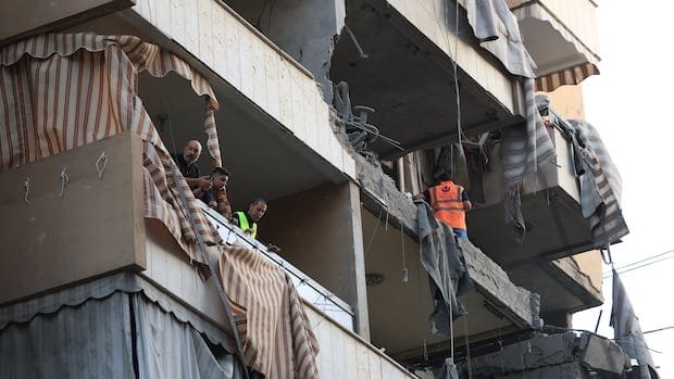 Israel strikes Lebanon's capital killing top Hezbollah official, despite ceasefire